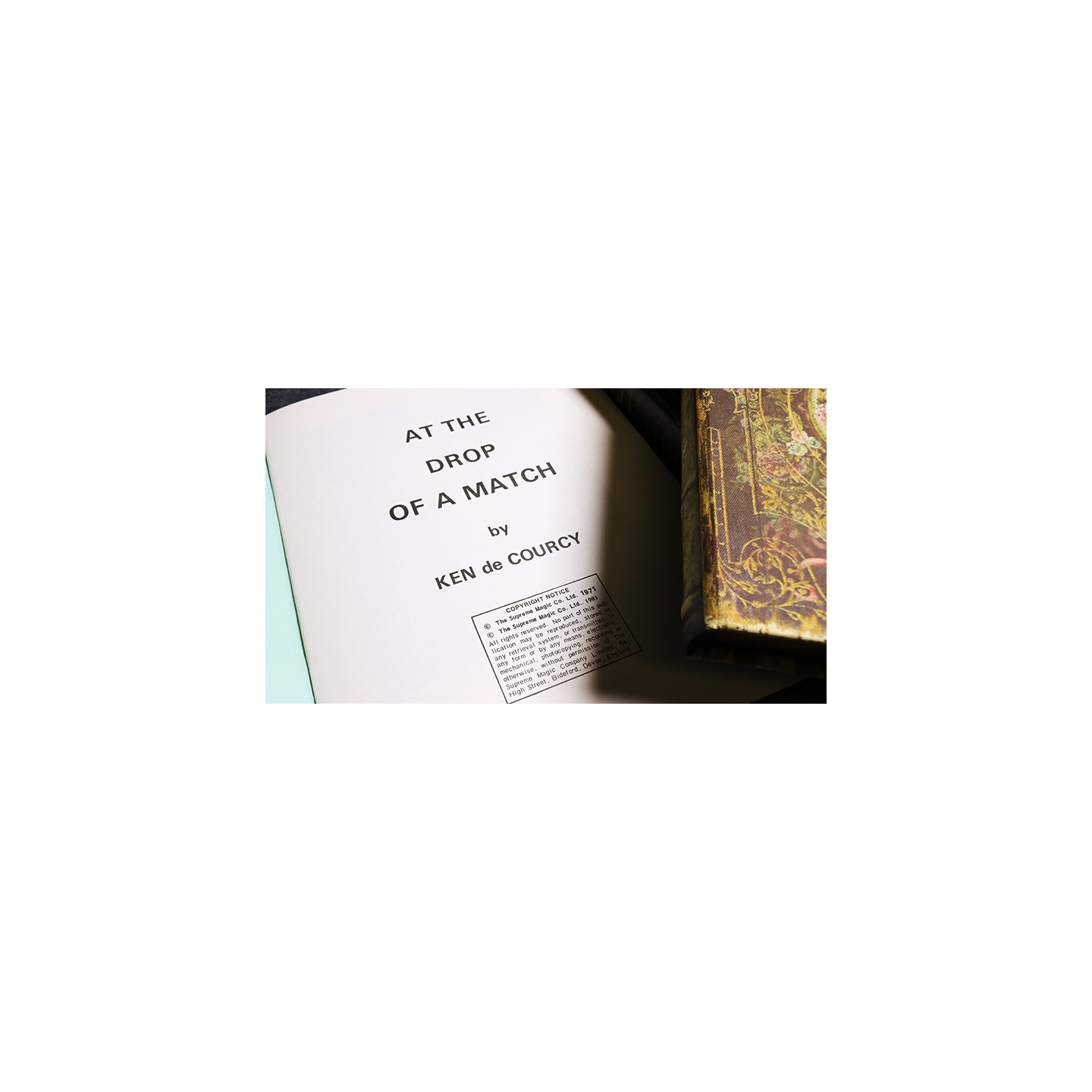 At the Drop of a Match by Ken De Courcy - Book