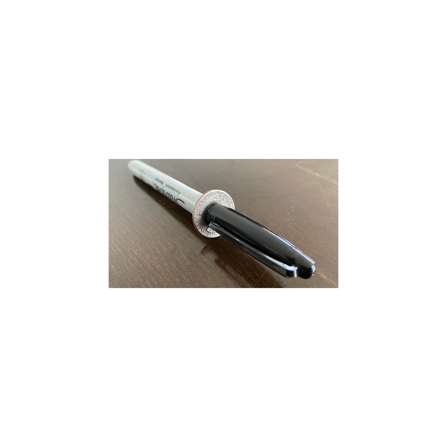 Sharpie thru Quarter (1 Side) by Tango