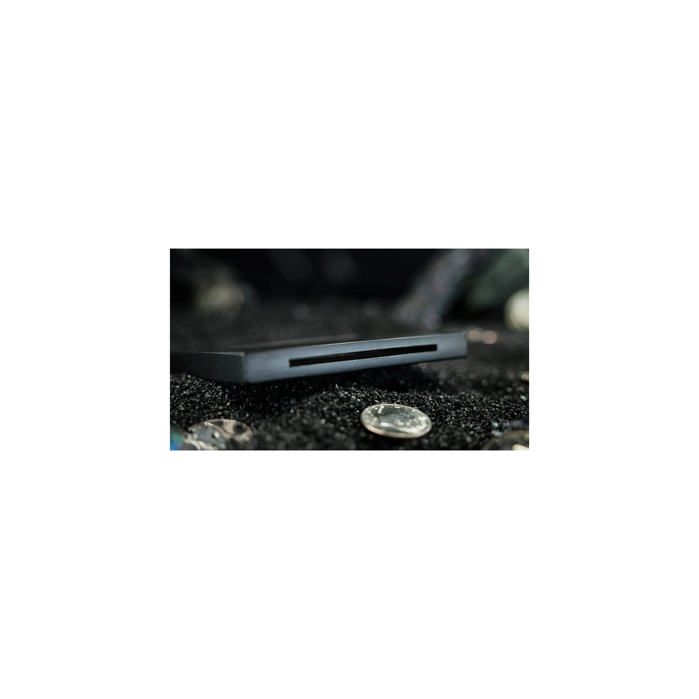 Coin Thru Anything by Nathan Kranzo