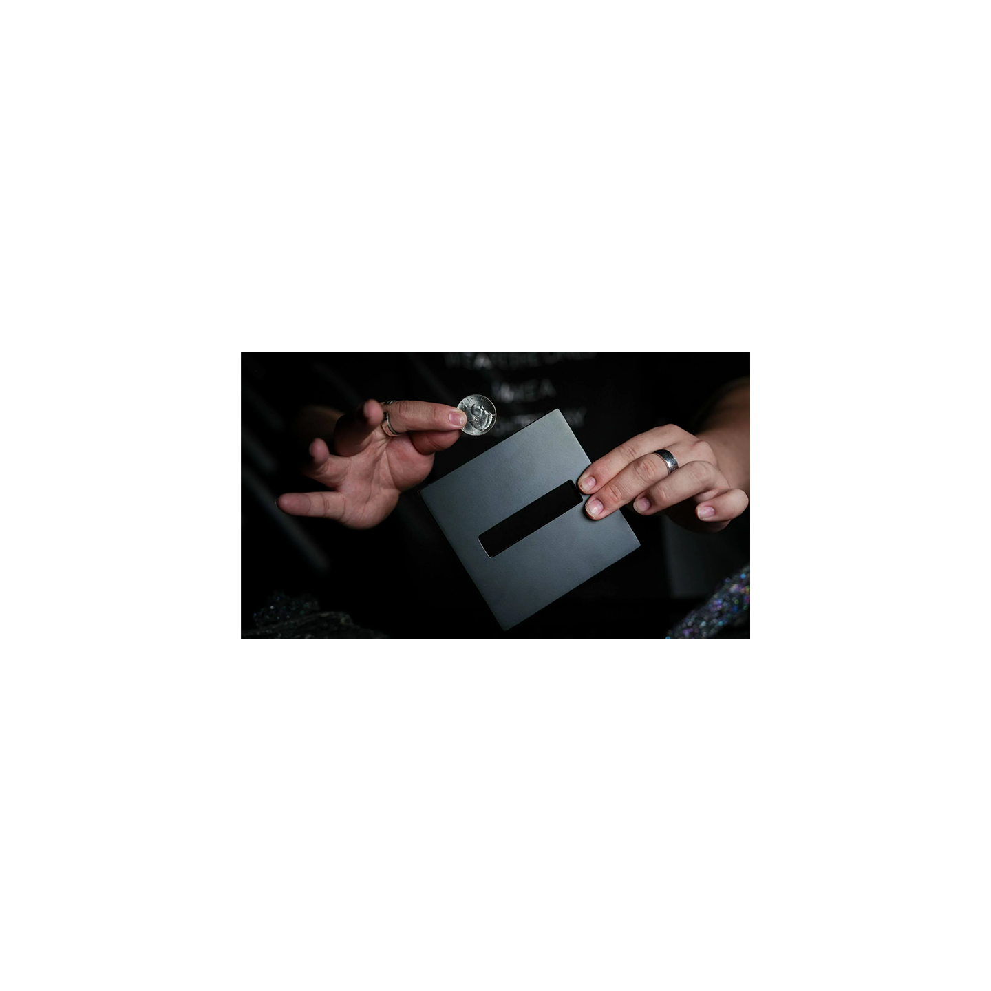 Coin Thru Anything by Nathan Kranzo