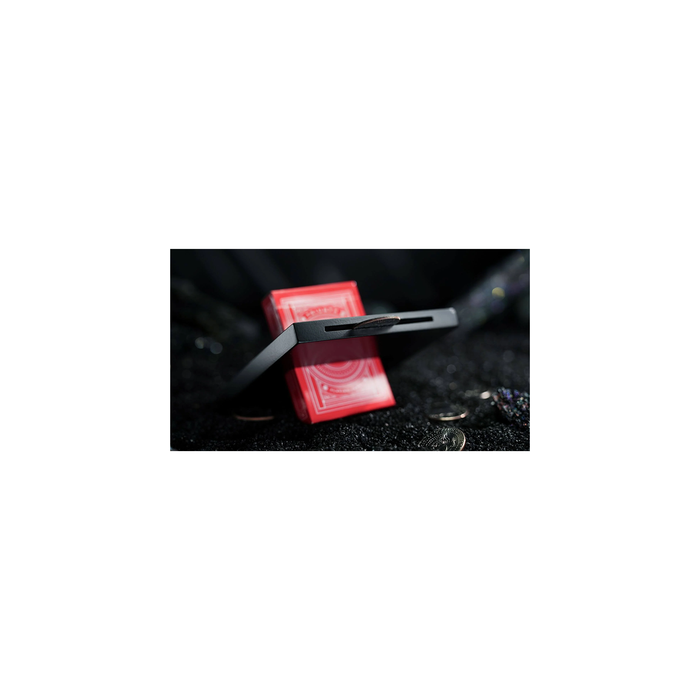 Coin Thru Anything by Nathan Kranzo